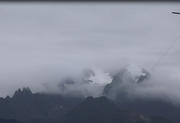 Deqen-Feilai monastery (altitude 3450 m); 20.08.2015; view to Meili mountain; Kawagebo peak (6740 m) and glaciers in clouds